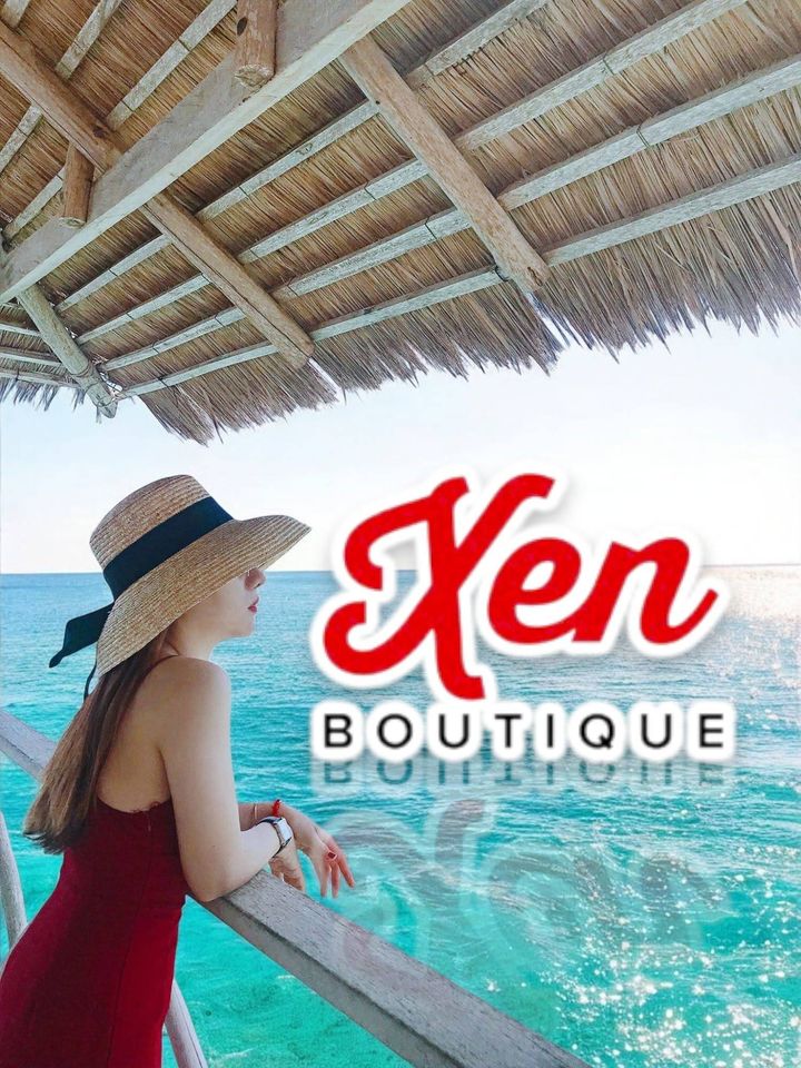 Nón cói vành rộng thắt nơ đen Xen Boutique đội khi đi biển